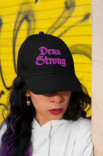 Dena Strong black dad hat with bright pink embroidered gothic lettering