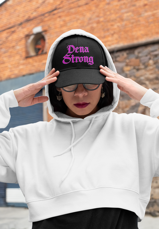 Dena Strong black dad hat with bright pink embroidered gothic lettering